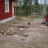Stenmuren i verkligheten. Första stenen