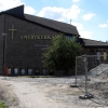 Område i förvandling Kyrkan ligger mitt i det nya ombyggda Enebytorgs centrum.  Juli 2010