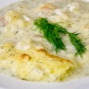 Ungsgratinerad fisk med egenodlad dill.
