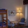 En våning återstår att renovera. Så här ser ett av 4-bäddsrummen ut på plan 3, men även här har alla rum toalett på rummet, dusch däremot i källarplan.
 
4-bedded room on the third floor with toilet inside, showers are common and found in the basement.