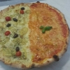 Can't make up your mind on which pizza to eat? Just take half and half :)
