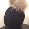 Vi har nu fått in ett litet parti av den trendiga mössan från svenskdesignade Wool & Wool. 
Den är gjord i 50% ull och 50% acryl och har naturligtvis en löstagbar tofs i äkta tvättbjörn.
Tvättbar i maskin på fintvätt 30°, avlägsna tofsen först bara...
