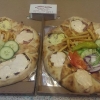 Vulkan pizza 1200 grams ( oxfilé ,fläskkebab,nöttkebab ,bacon,skinka,köttfärs,kyckling,champinjoner,lök,pommes,sallad,tomat,gurka,pepperoni,kebabsås,vitlöksås,bearnaisesås)