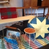 Pinnsoffa, sittpuff och plastmatta. 50-tal