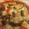Dagens pizza ROMA : oxfilé, gorgonzola, paprika, champinjoner, tomater, lök