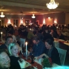 Pelle Ferm och Roland Nilsson underhåller vid ett fullsatt julbord