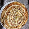 Makkes pizza klar å servera