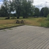 Vy från badbryggan. Grillplats till höger och det finns en till åt vänster.