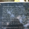  En informationstavla på utsidan.