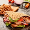 It’s a love triangle. The German Döner Kebab.