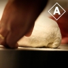 A perfect pizza has a perfect crust, and perfect crust begins with a perfect dough. The special recipe of our dough made by our Italian chef is a secret, but we can tell you it's a 26 step long procedure to make it. It's slow-fermented, organic and made w