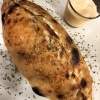 Någon hade beställt en Calzone!

Välkomna!