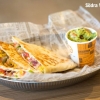 Nu har vi  Quesadillas för veganer på Zócalo!

Nu serverar vi veganost från VioLife i alla våra vegetariska quesadillas.  VioLife osten är baserat på kokosolja, helt glutenfri, fri från soja och palmolja.  

Vi har två vegetariska quesadillas på Zócalo.  