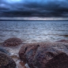 Bild av @mikeys72 - The rock! #rock #stones #lake #vombsjön #water #ig_nature #nature #landscape #dark #clouds #sky #skyporn #sweden #winter #cold