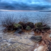 Bild av @mikeys72 - The lake! #vombsjön #shore #rock #stones #sand #water #sunset #dark #clouds #winter #sky #skyporn #nature #ig_nature #view