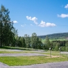 Campingplats för husbil och husvagn med utsikt mot Kalvsjön