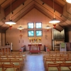 Översiktsbild på kyrksalen och altaret samt orgel mm.
