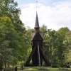 Klockstapeln står en bit ifrån kyrkan