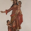 Staty invid dopfunten, Bro kyrka