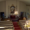 Altaret sett från läktaren. Här syns två av de fyra evangeliemålningarna