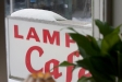 Lampas café har hängt med ett tag. Skylten på Folkets Hus nära stationen visar vägen.