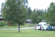 Vy över stugor och övre del av camping