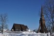Vintern famnar kyrkan.