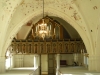 Läktarbarriären pryds av de tolv apostlarna med Jesus i mitten