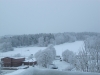 Vy över Tumba kyrka och gärde