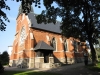 Kyrkan byggd i nygotisk stil och har fasad i rött maskinslaget tegel Augusti 2010