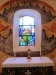 Altaruppsatsen med ett vackert ljusinsläpp via korfönstret.Fönstret är skänkt av Crawfordska stif-e.