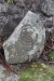 En mytomspunnen sten utanför kyrkporten.