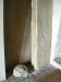 En liljesten i sandsten från 1100-talet med ett S:t Georgskors överst