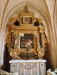 Altaruppsatsen med infällda bilder av donatorerna