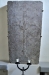 En gravsten över kyrkoherden Erledus död 1345. Hans bild är inristad i stenen