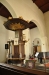 Krucifixet ovan altarskåpet är utfört av en lokal bildhuggare