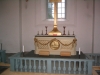Altaret i den härligt ljusa Öveds kyrka