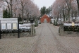 Mjölby kyrka har sin gravplats och kapell på västra sidan om staden.