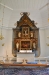 Altaruppsats i barockstil med krucifix och de fyra evangelisterna
