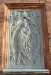 Johannes Döparen och S:t David på den stenrelief som sitter till höger om västra portalen